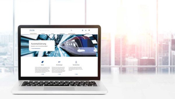 Laptop mit Startseite des neuen E-Shop & Website der Omni Ray AG